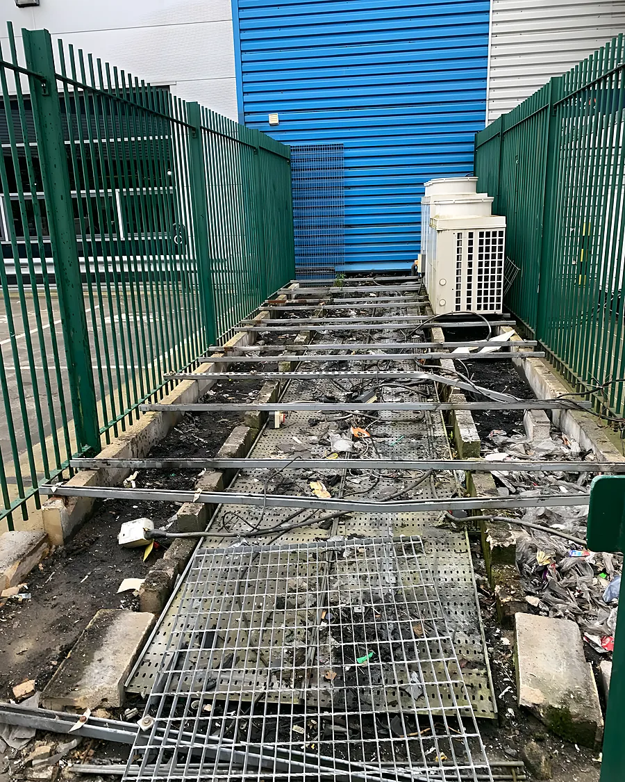 The same plant deck with the condensers and the grating removed, back to bare concrete